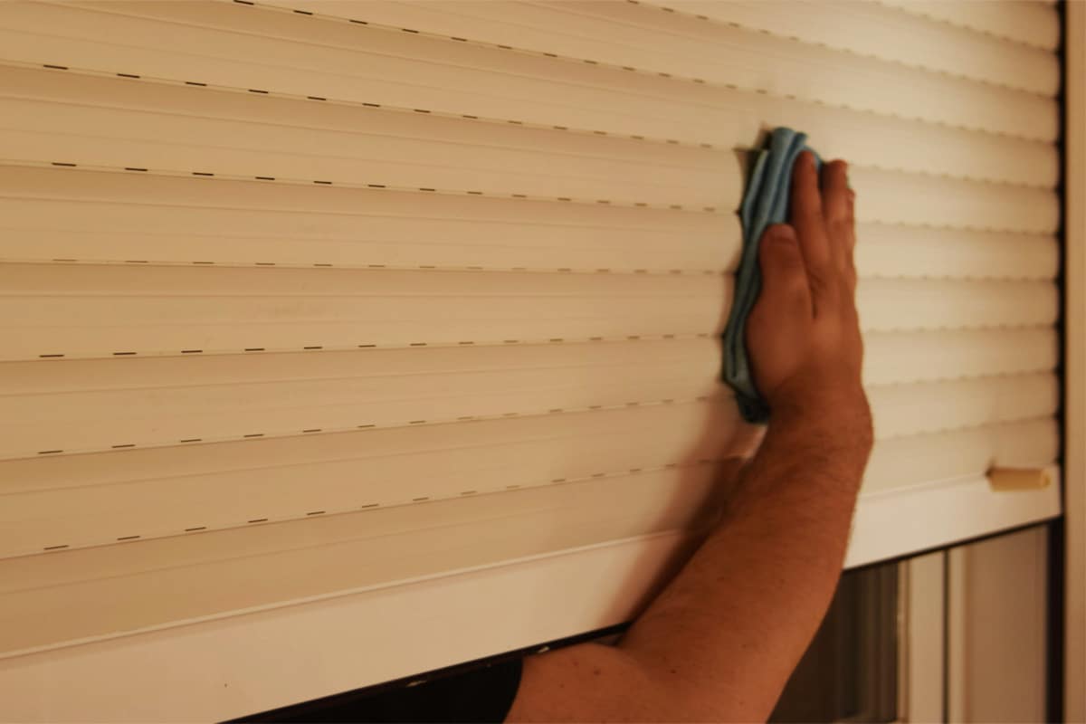 Showing how to clean shutters on the outside without dismantling them